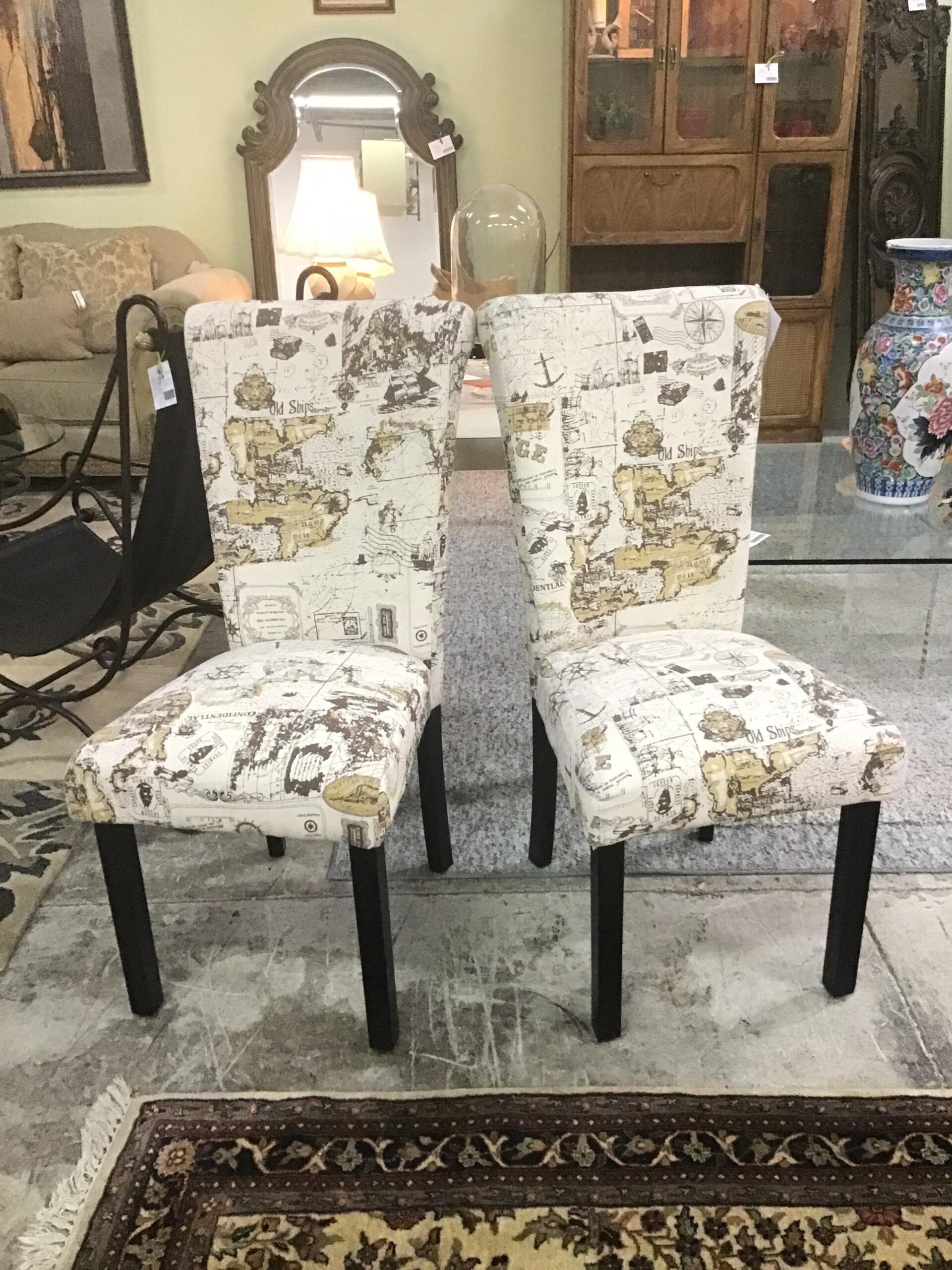 (Pair) “World Travel” Upholstered Parson Chairs