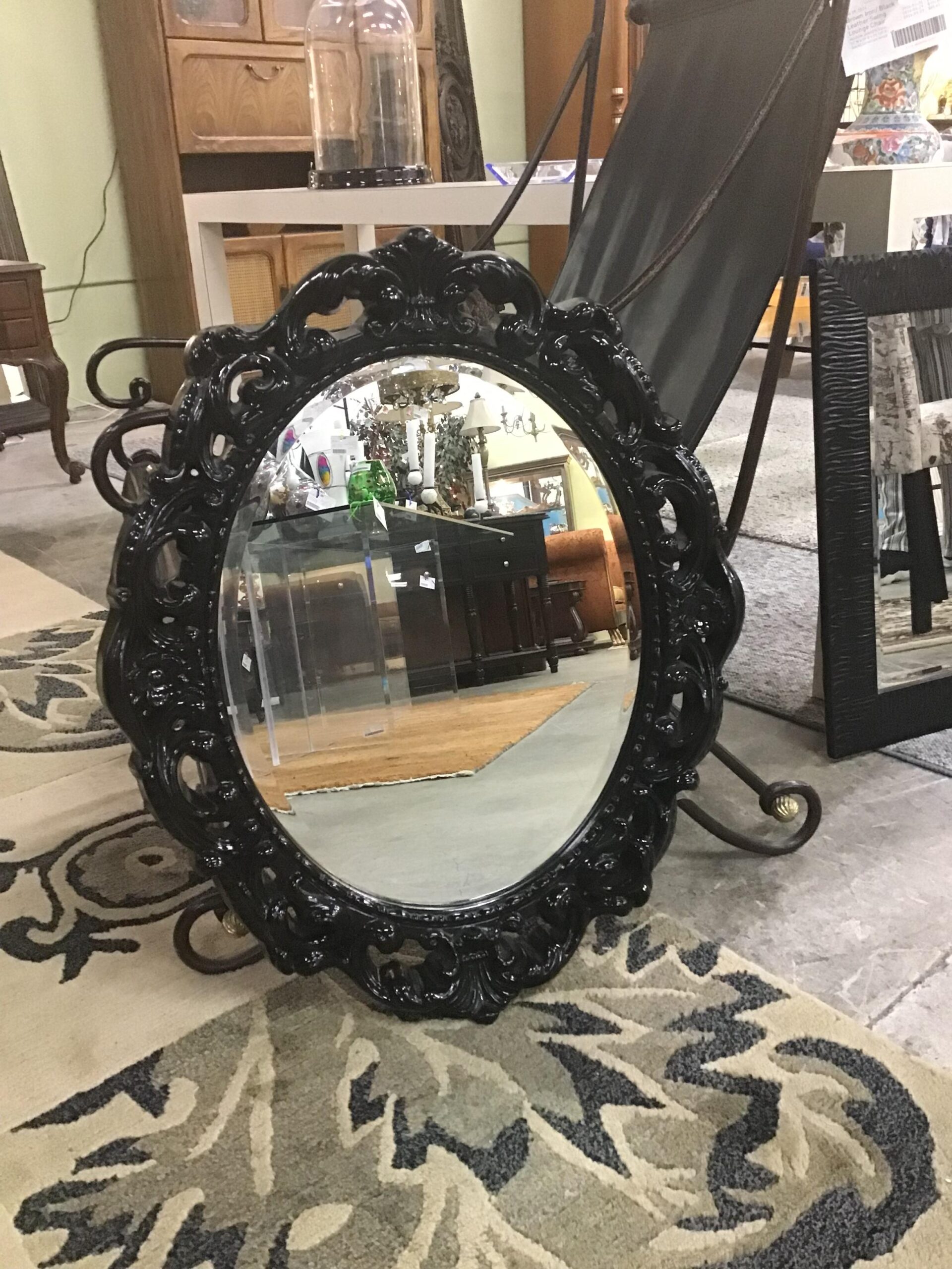 Ornate Black Oval Mirror