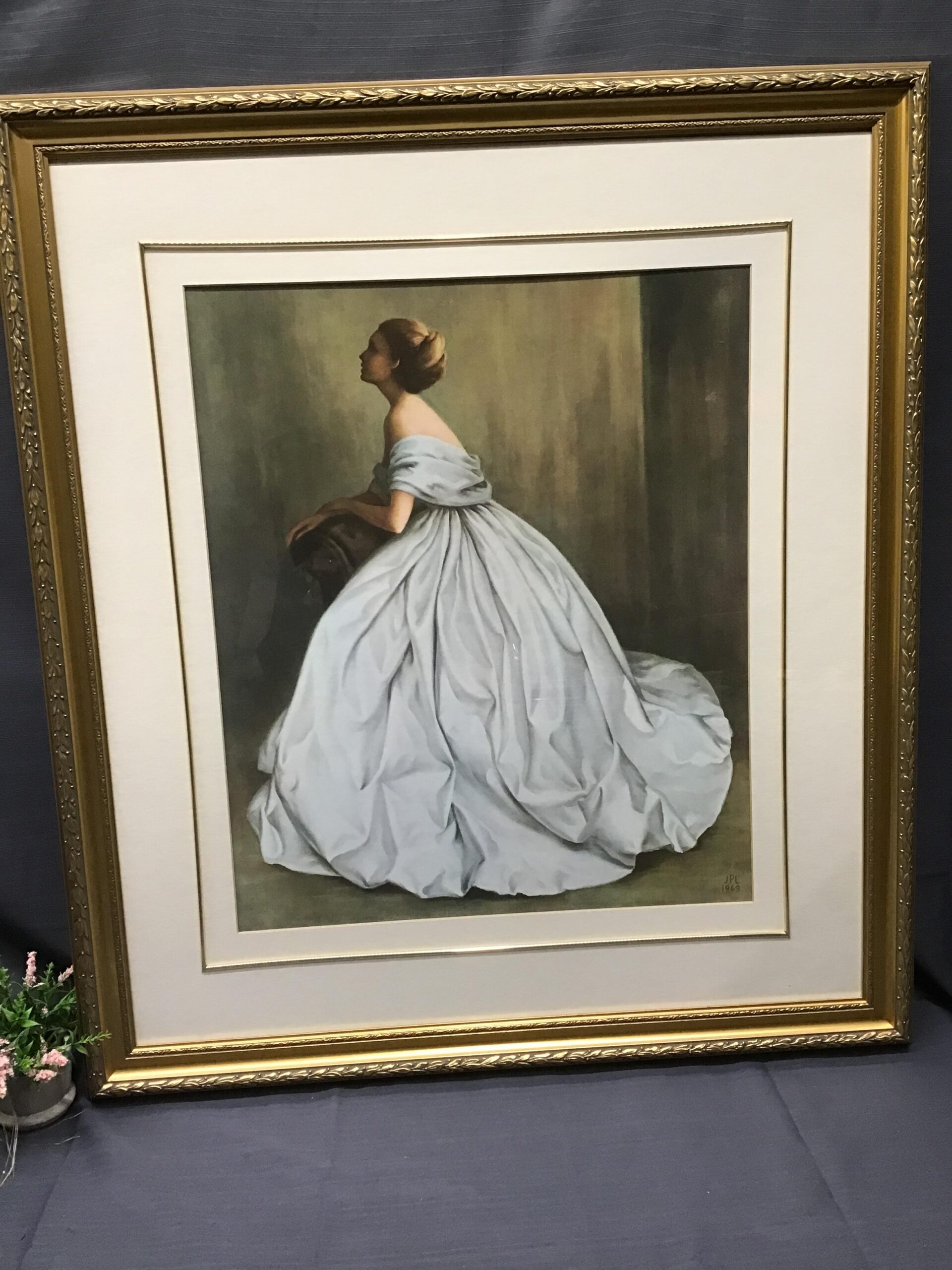 Profile of Siting Woman in White Gown