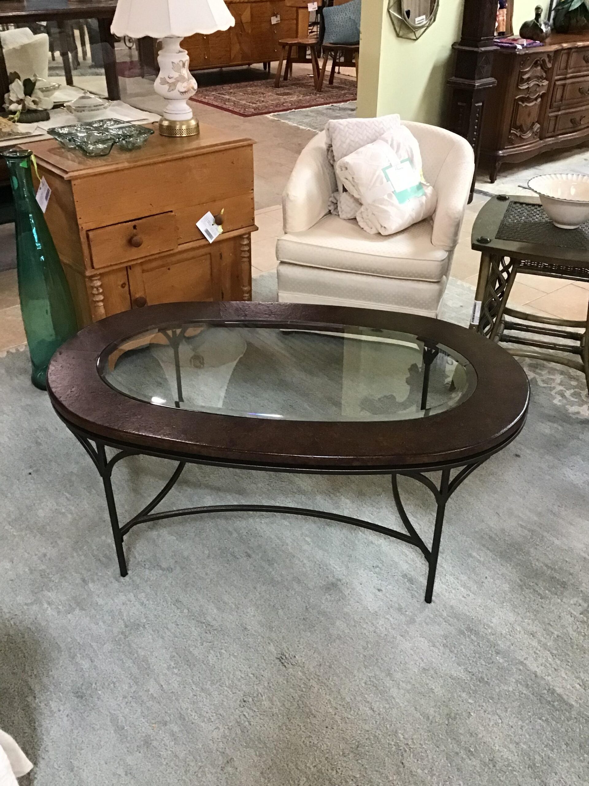 Oval Coffee Table with Iron Base