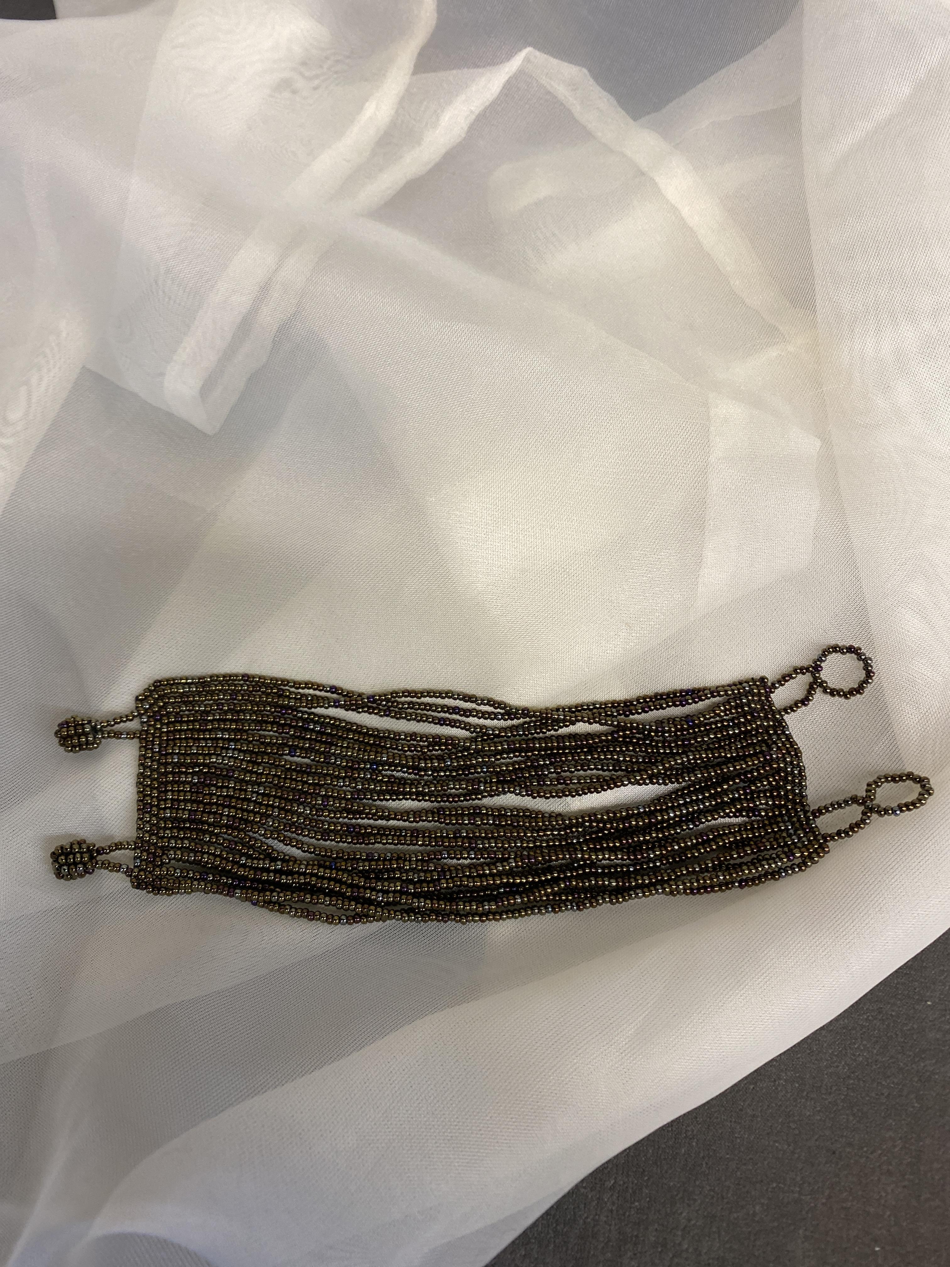 24 Strand Seed Bead Bracelet – Bronze