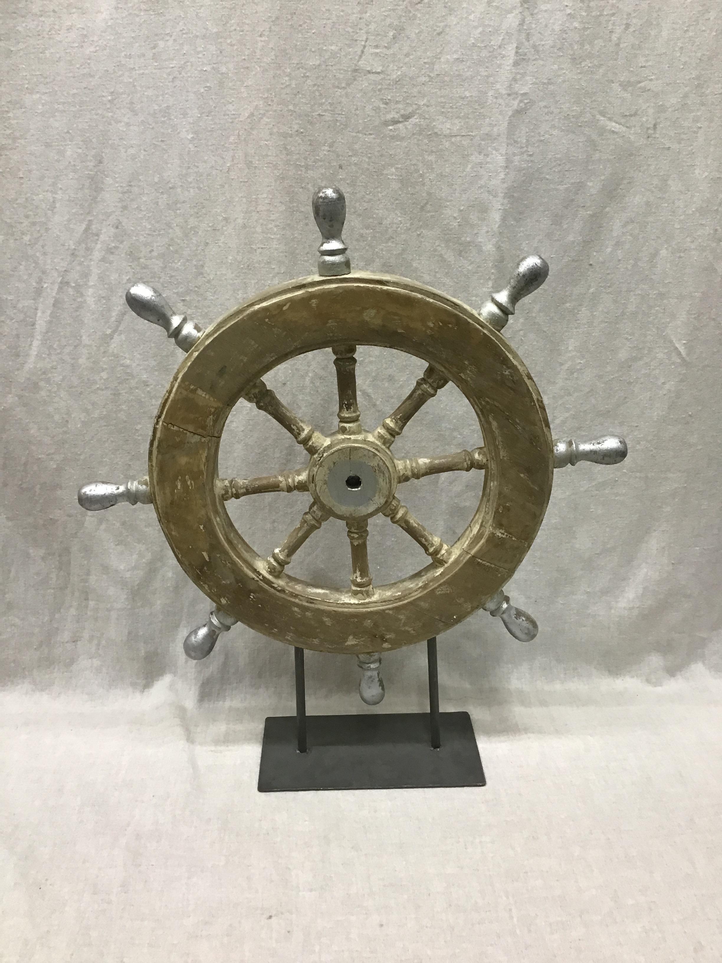Distressed Wood Ship’s Wheel on Metal Stand