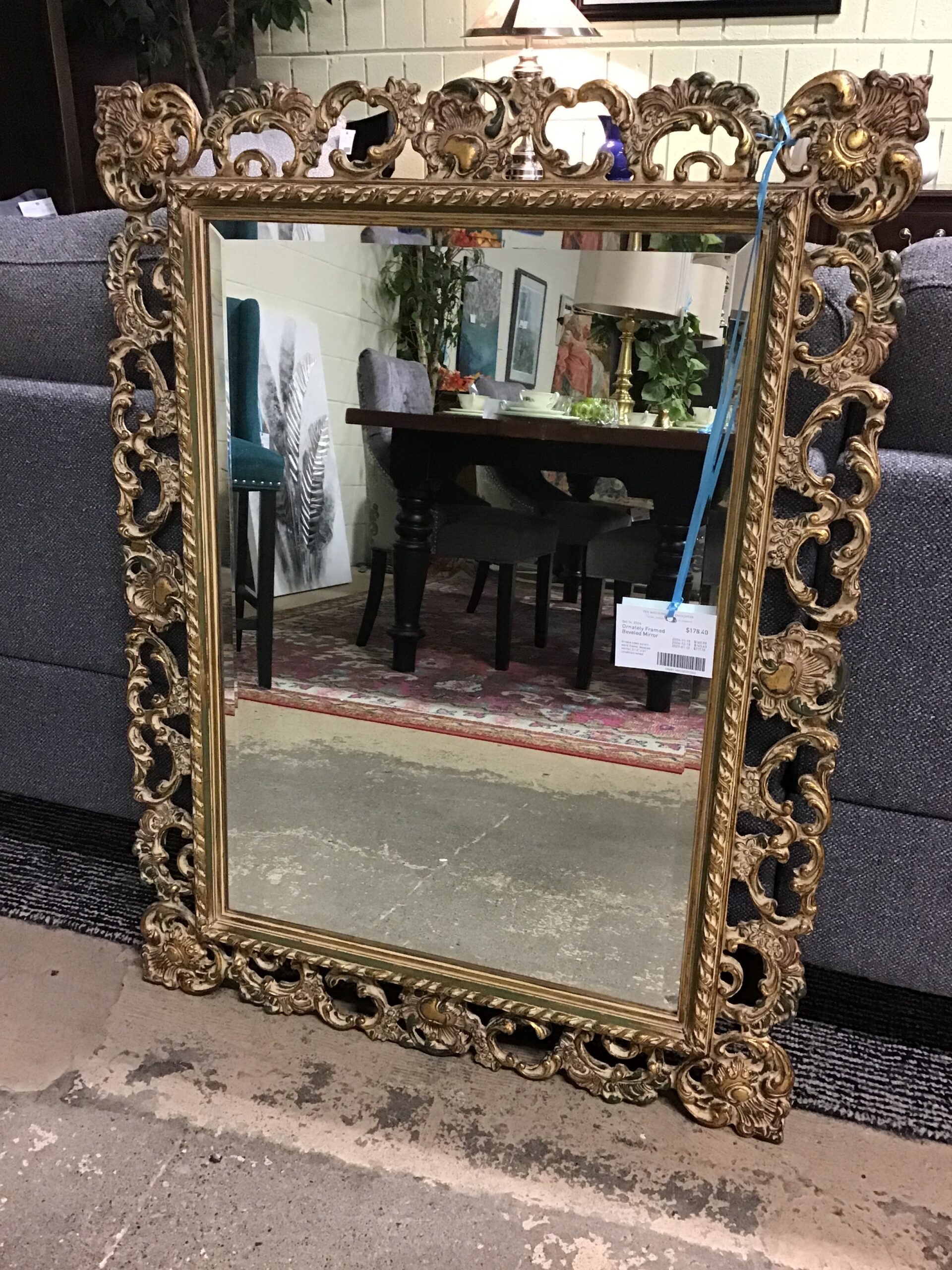 Ornately Framed Beveled Mirror